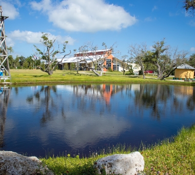 A view of our dining hall from across the fishing pond
Photo by: Beyond Memory Photography