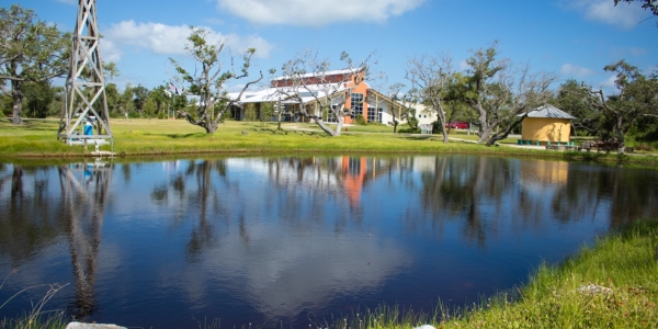 A view of our dining hall from across the fishing pond
Photo by: Beyond Memory Photography