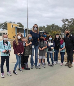 FLC Birding Team and their sponsor, Ms. Martha McCleod, smile for group photo with Camp Director, Amelia