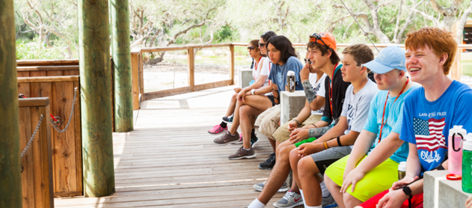 Campers smiling and laughing.